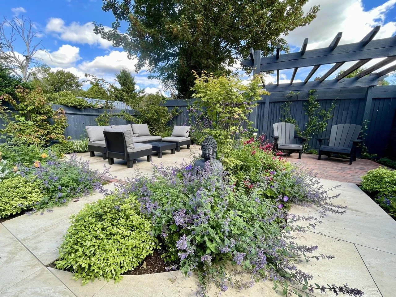 Gardens by Knight courtyard garden view of two seating areas.jpeg