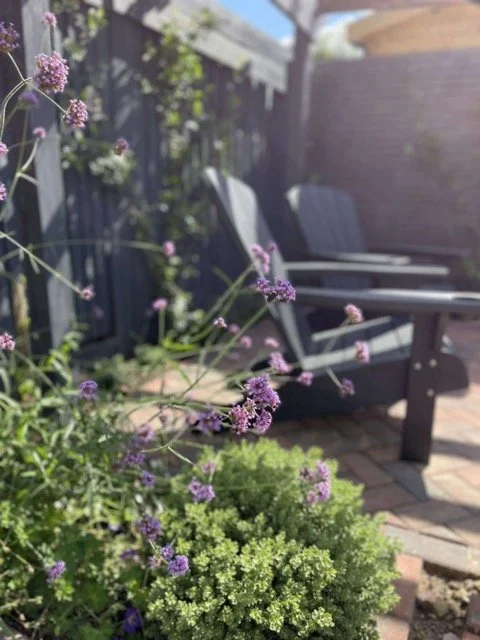 Gardens by Knight courtyard garden with adirondack chairs.jpeg