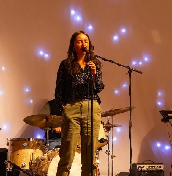 Singer performing live, client of Gemma Milburn vocal coaching