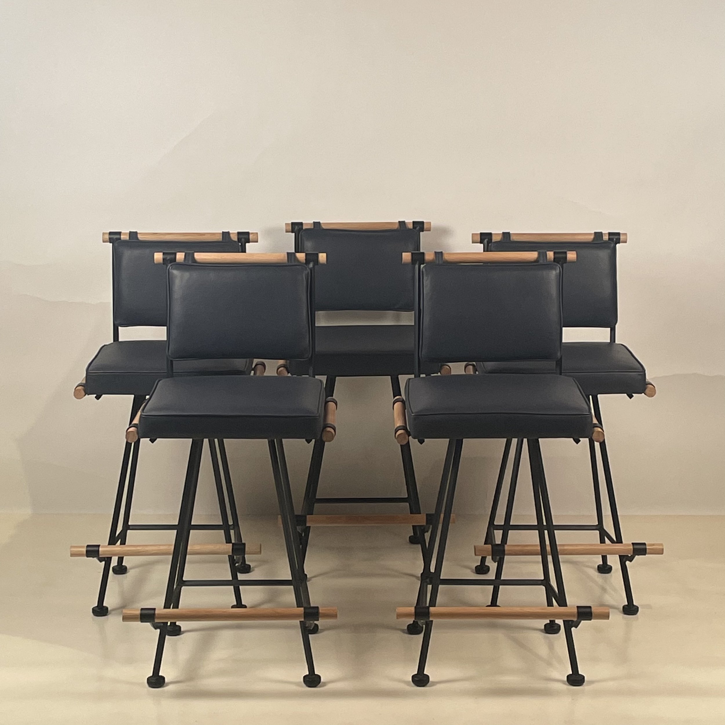 LOS FELIZ black leather stools.jpeg