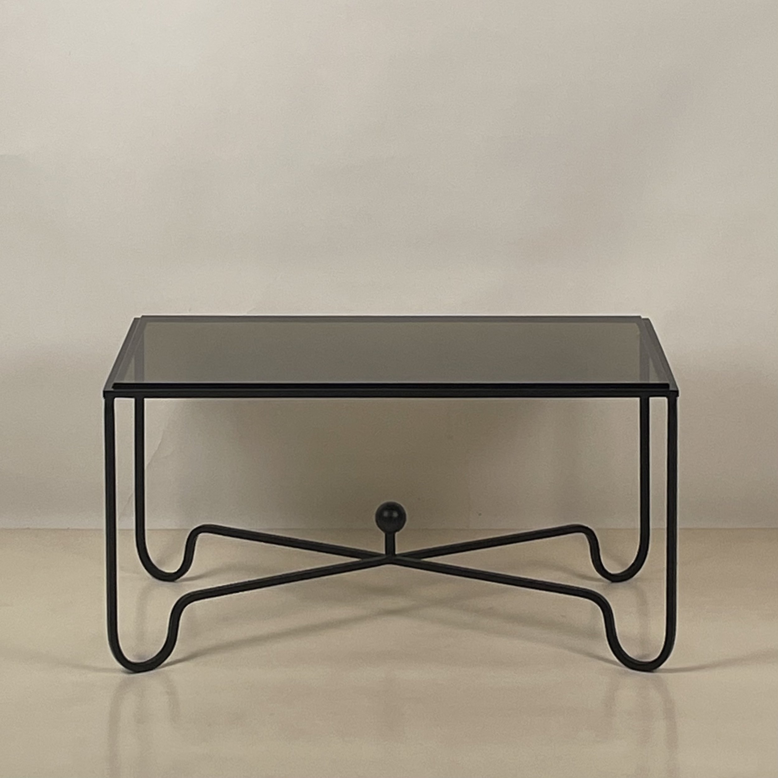 Entretoise smoked glass coffee table.jpeg