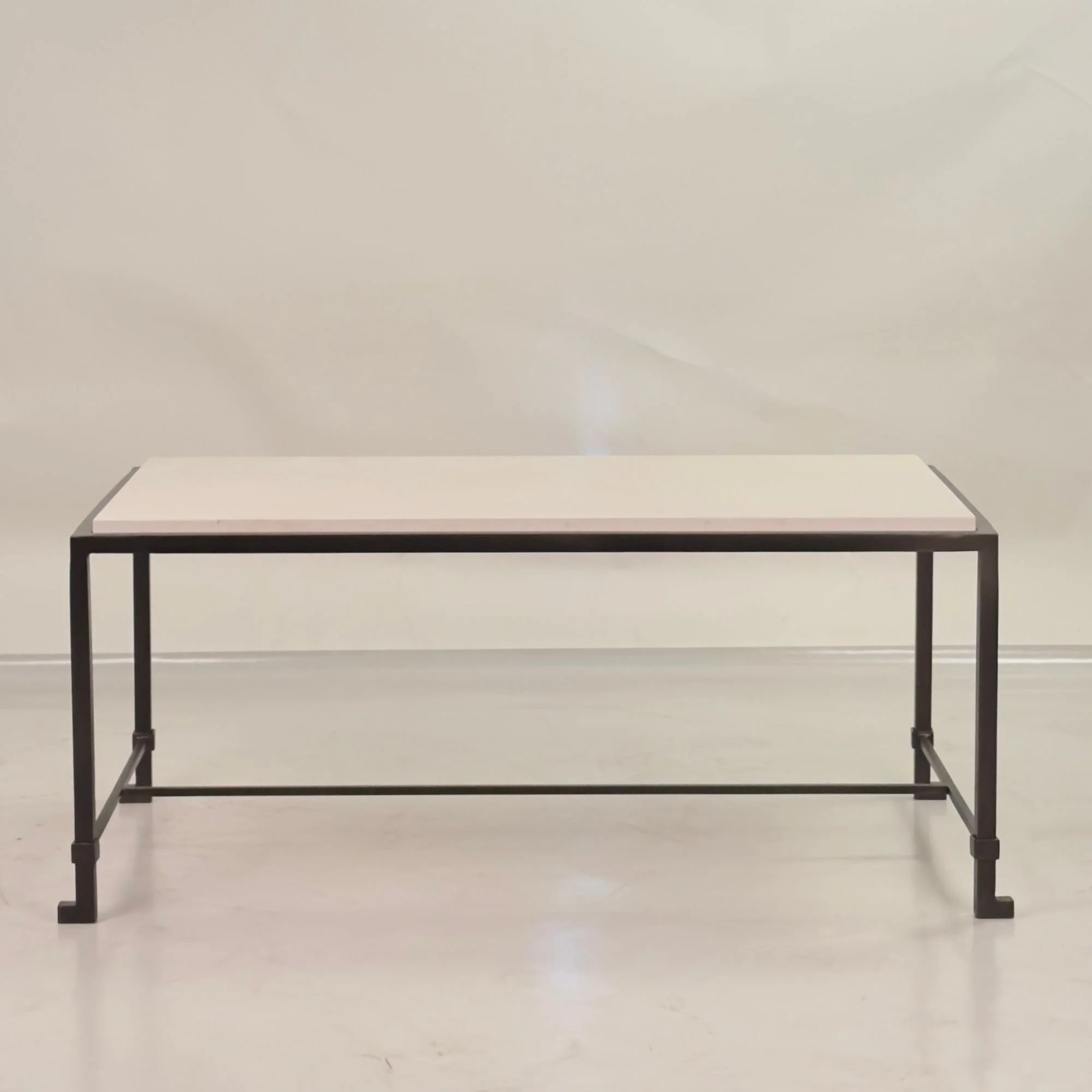 Small Diagramme dark bronze limestone coffee table edit.jpg