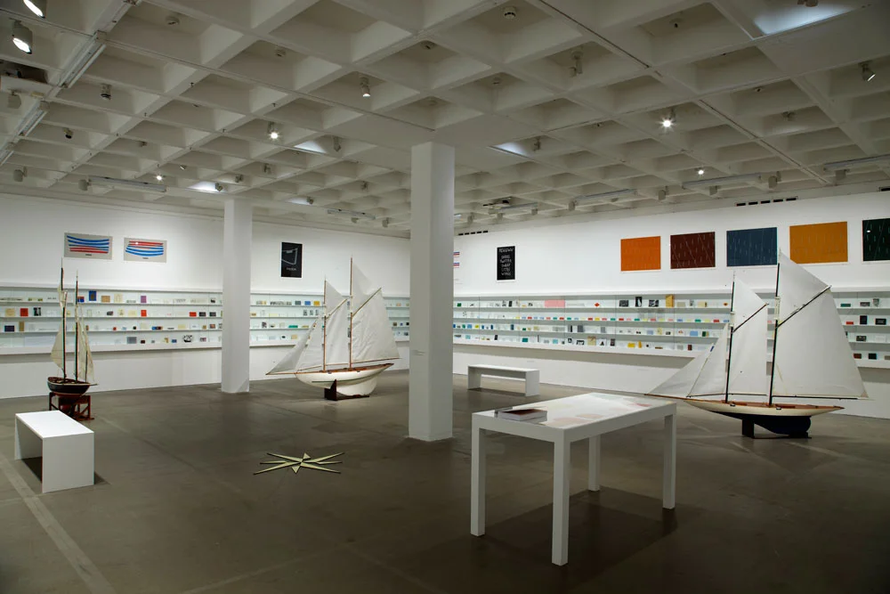 Ian Hamilton Finlay , Installation view of the exhibition presenting an extensive collection of Ian Hamilton Finlay's book works and printed matter at the Arnolfini, Bristol, in 2013. (Photo: Stuart Whipps, courtesy of Arnolfini).