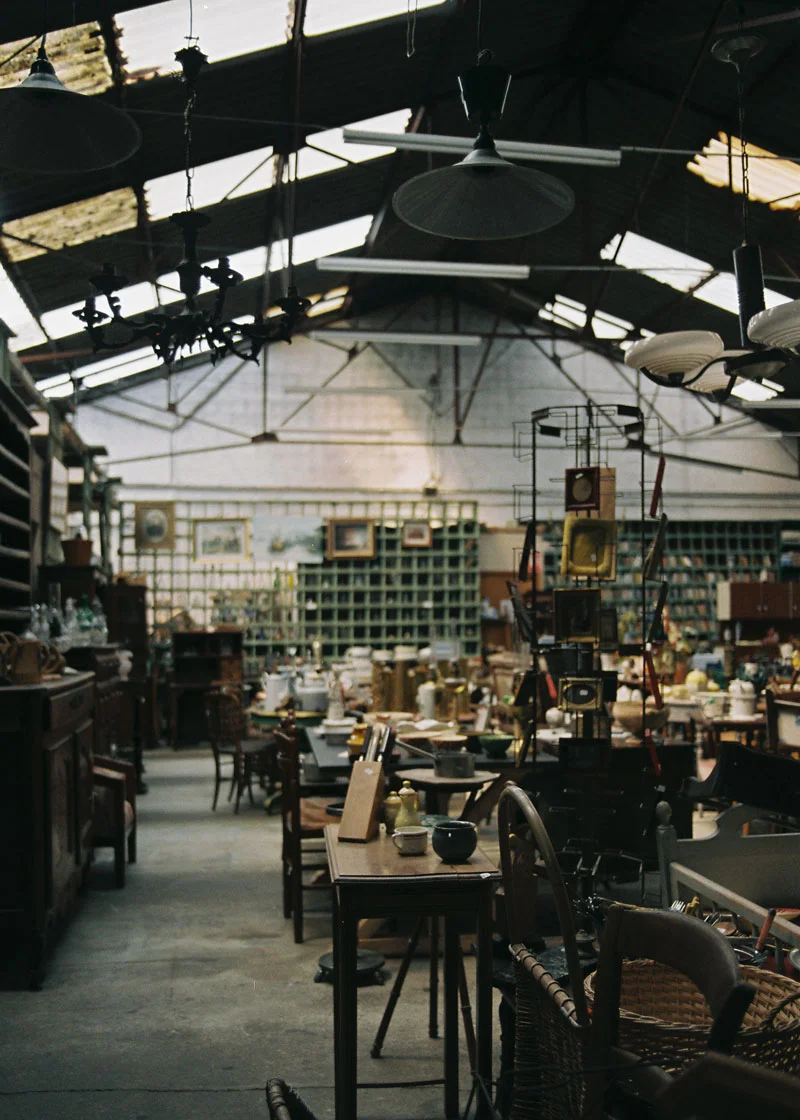 Flea markets, antique fairs, and salvage yards have provided many of the supports for the works in the exhibition.
