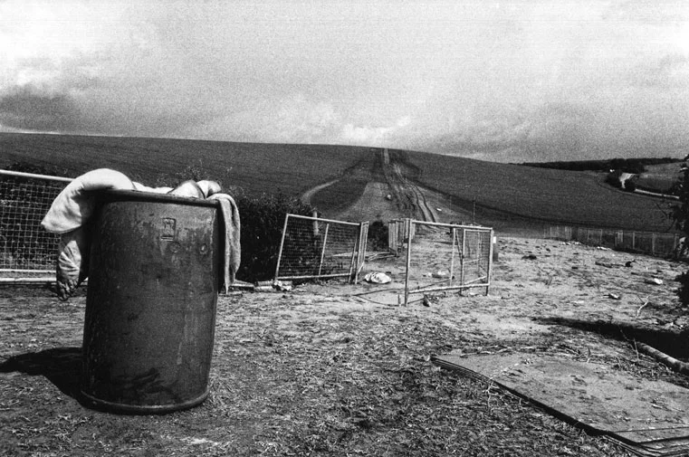 Club Culture as Rural Festival : Twyford Down, England, aftermath of field rave, three hours after the eviction of sound systems and dancers (From Locating the Wild Zone by Ian McKay, 2001). (Photo: © Ian McKay)