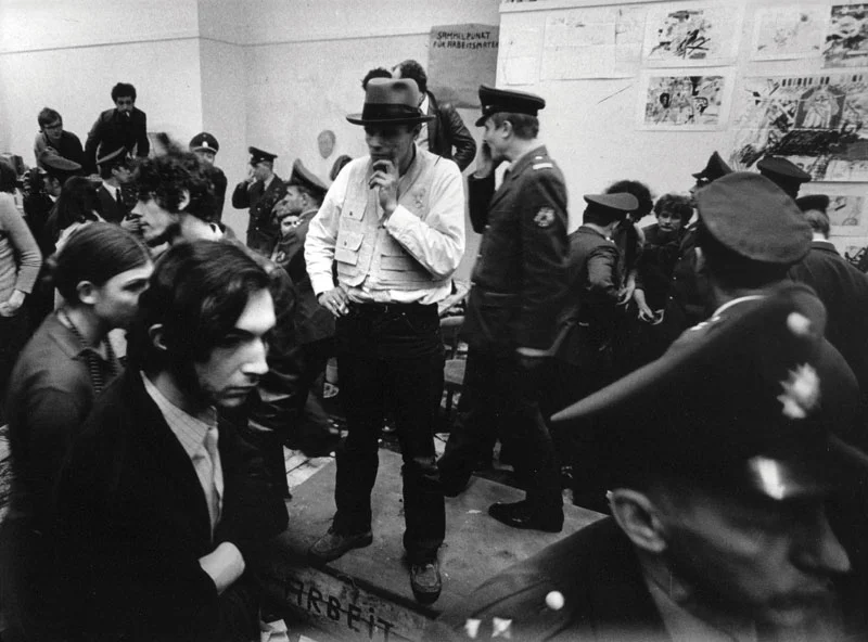 Joseph Beuys during the eviction of the secretariat of the State Art Academy in Dusseldorf, 1972 . (© zeroonefilm / Bernd Jansen). (Photos from the film BEUYS, 2017, Directed by Andres Veiel, courtesy Zero One Film / Piffl Medien GmbH / Arne Höhne Presse).