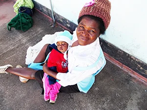 ZimWomanWBaby.jpg