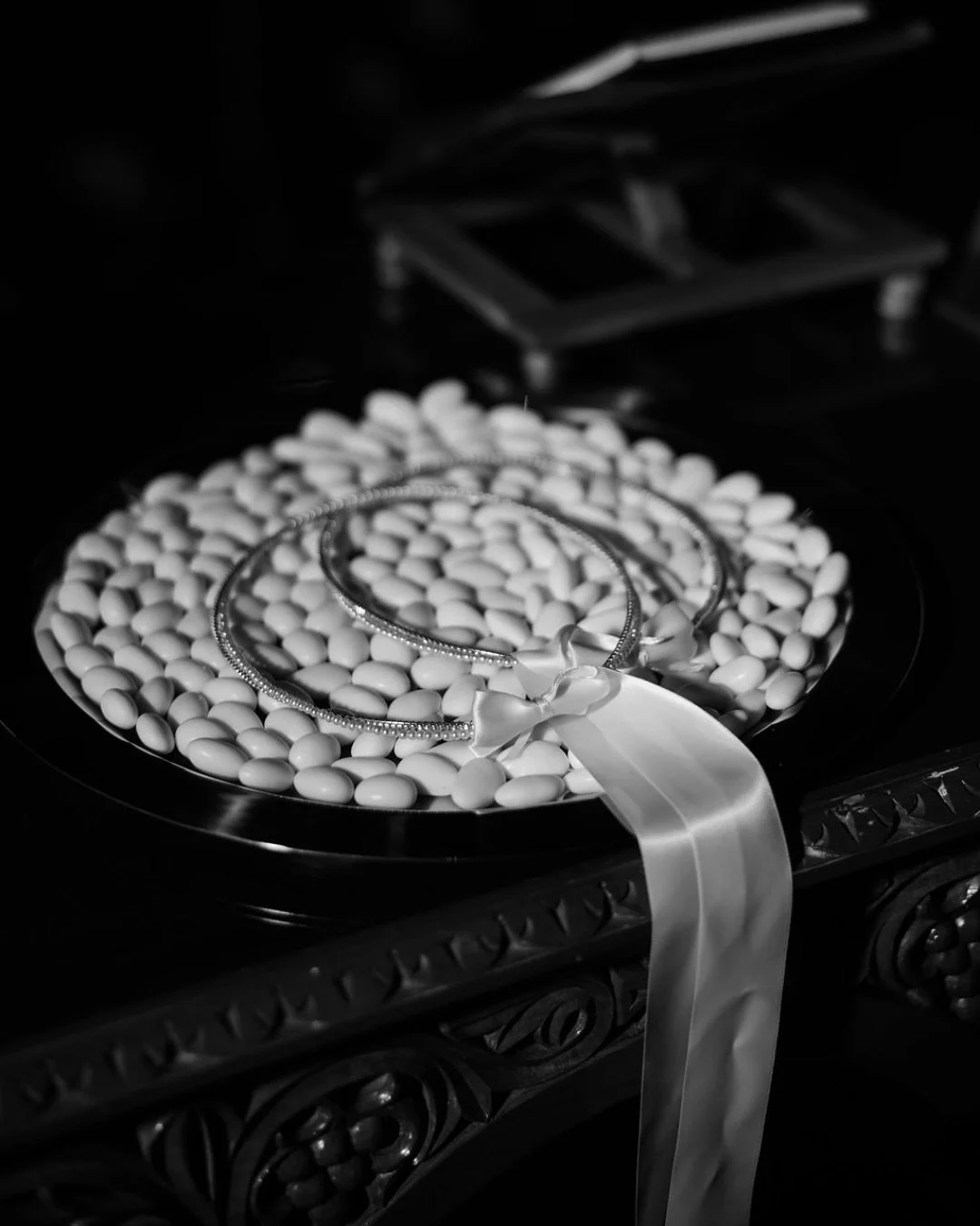 N+A&rsquo;s ceremony unfolded with quiet grandeur - candlelight flickering softly, stefana resting delicately and crystal chandeliers casting their glow from above. Every detail was layered with meaning, creating a setting that was both reverent and 