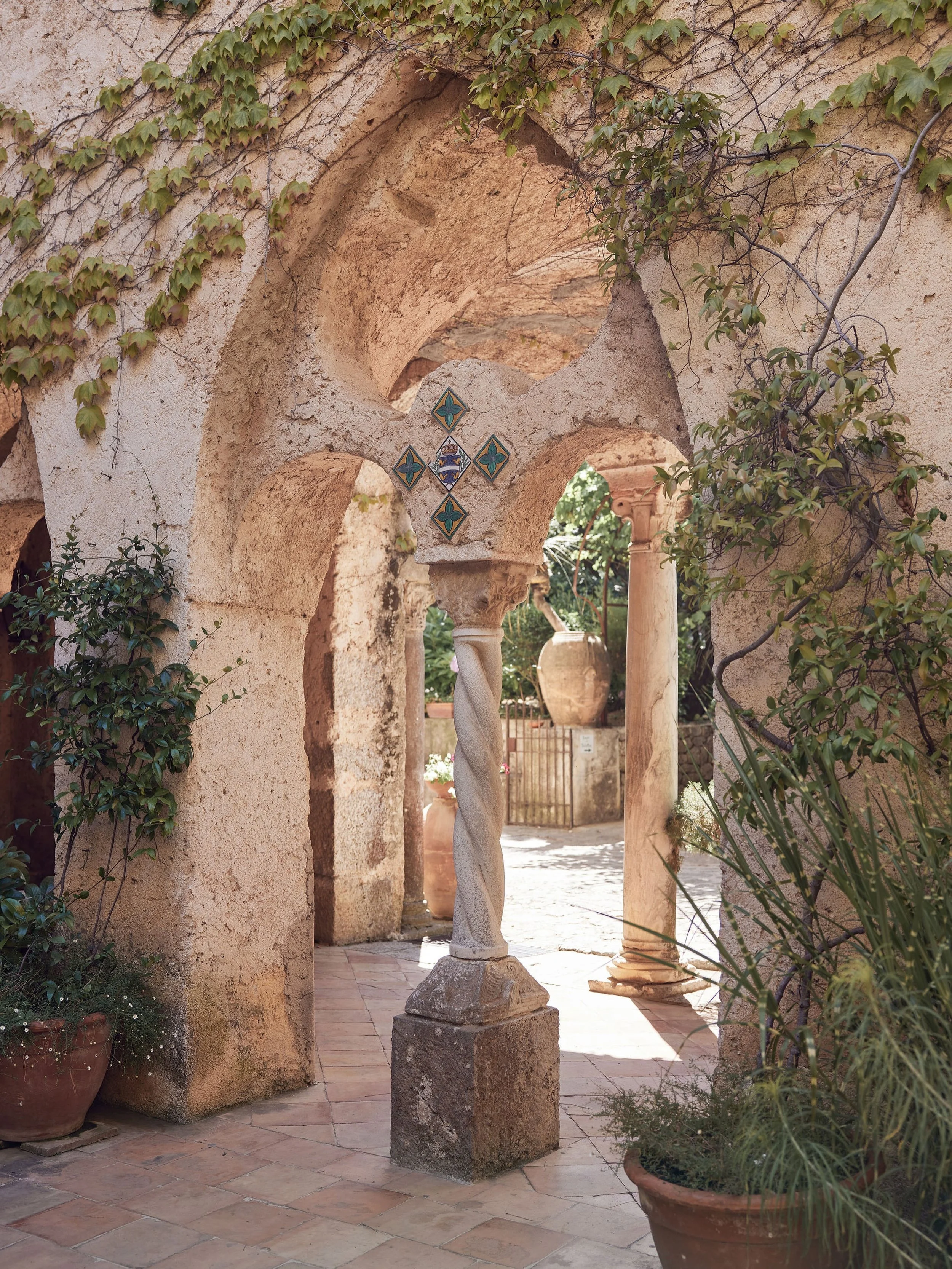 One of the details we love most about Villa Cimbrone is that the beauty extends far beyond its famous Terrace of Infinity.

Dating back to the 11th century, the villa is a maze of historic archways, cloisters, gardens and hidden corners overlooking R