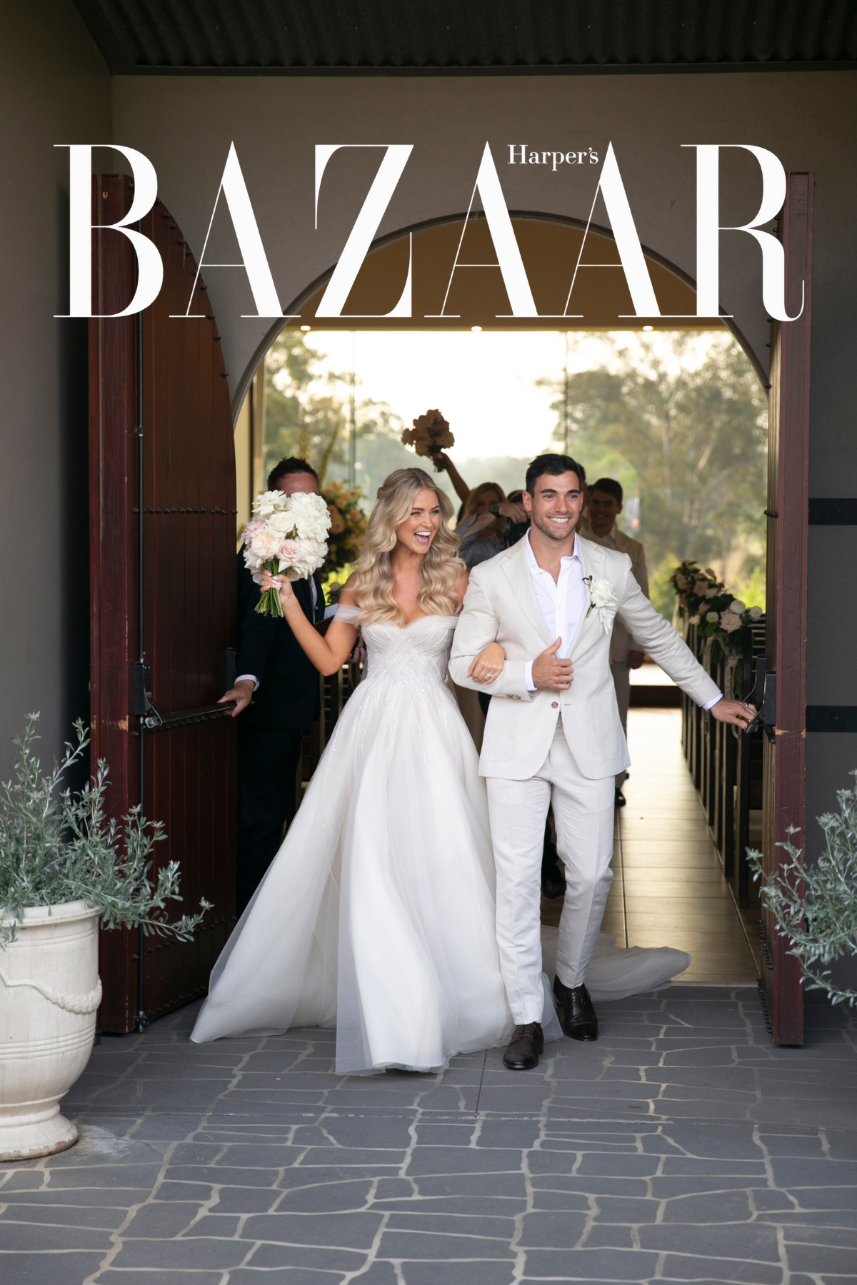 Harper’s Bazaar — couple celebrating after their ceremony