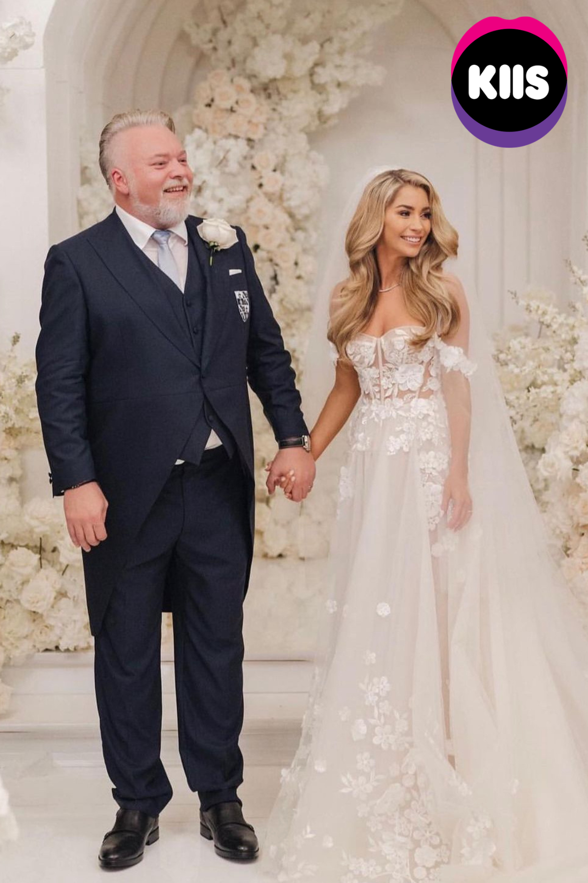 KIIS — wedding couple at a floral ceremony