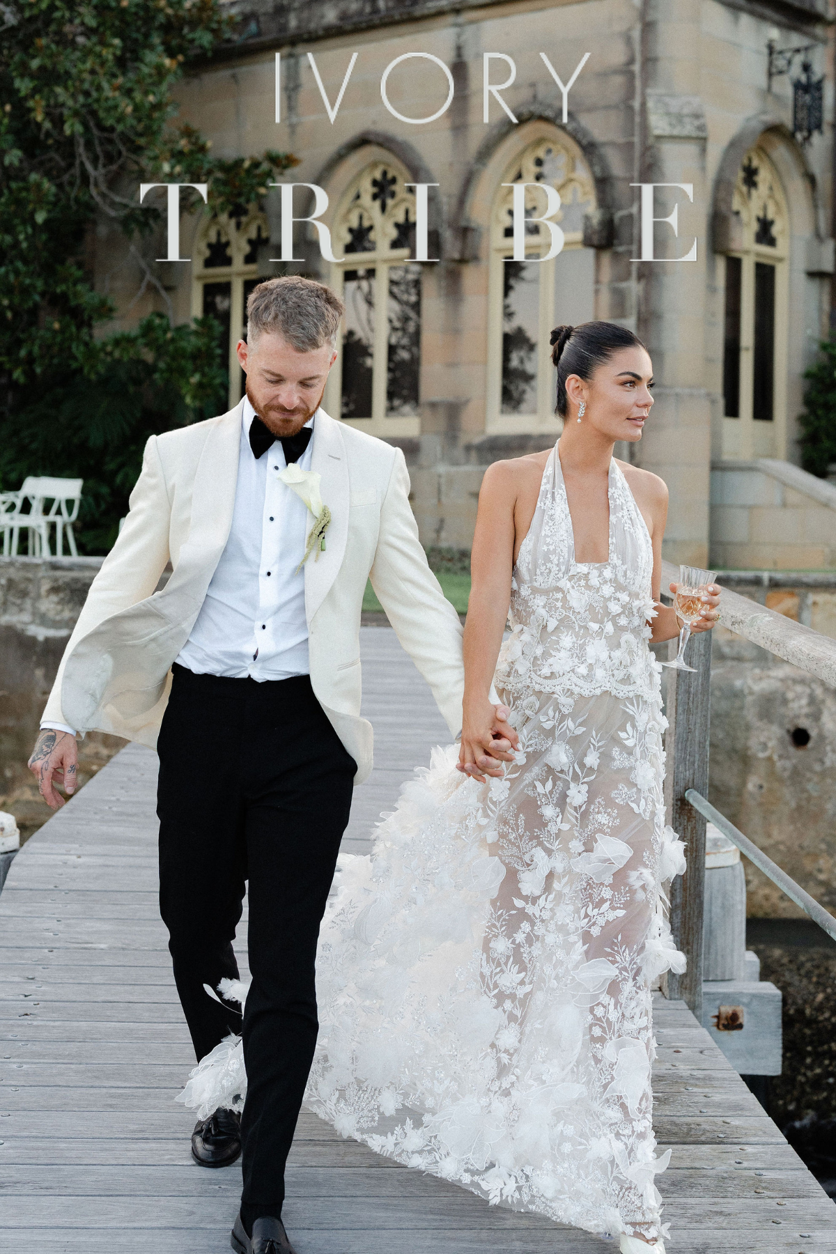 Ivory Tribe — wedding couple on a boardwalk