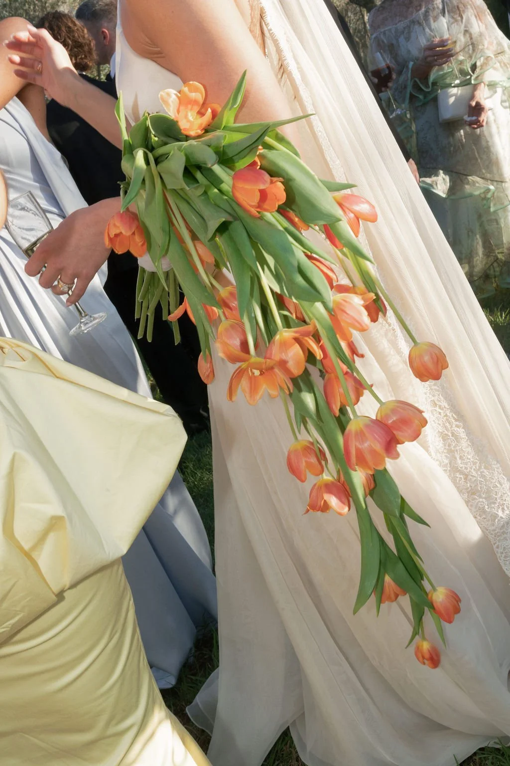 A cascading bouquet of orange tulips.
