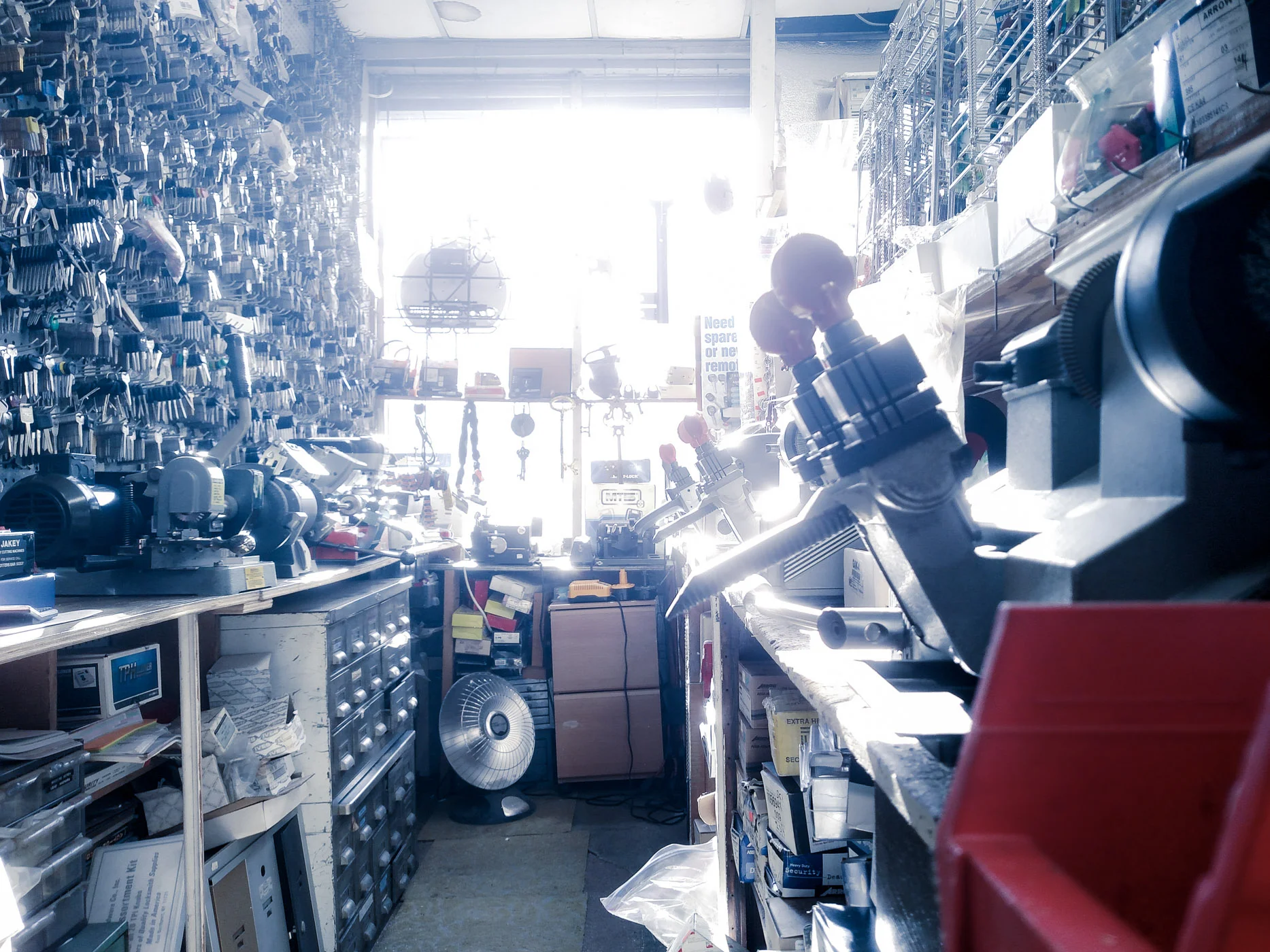 Behind the Counter / / At the locksmith shop, 2016 / / The morning light through that window, was one of my favorite things about that place. Until the shop moved to a new location.