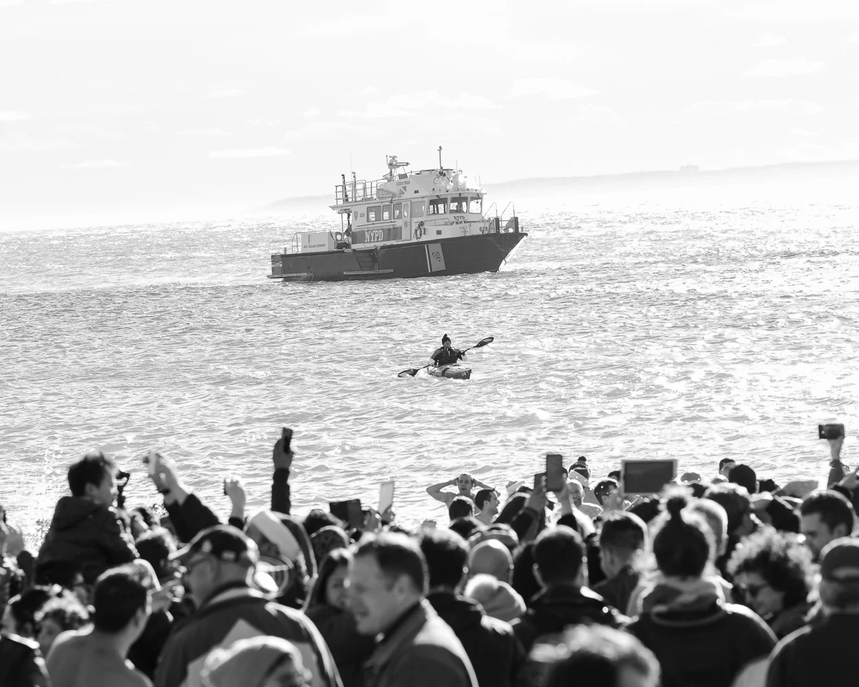 Rowing over a sea of faces
