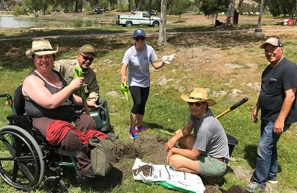 Sarah Panfil, left, at ERG tree planting event.