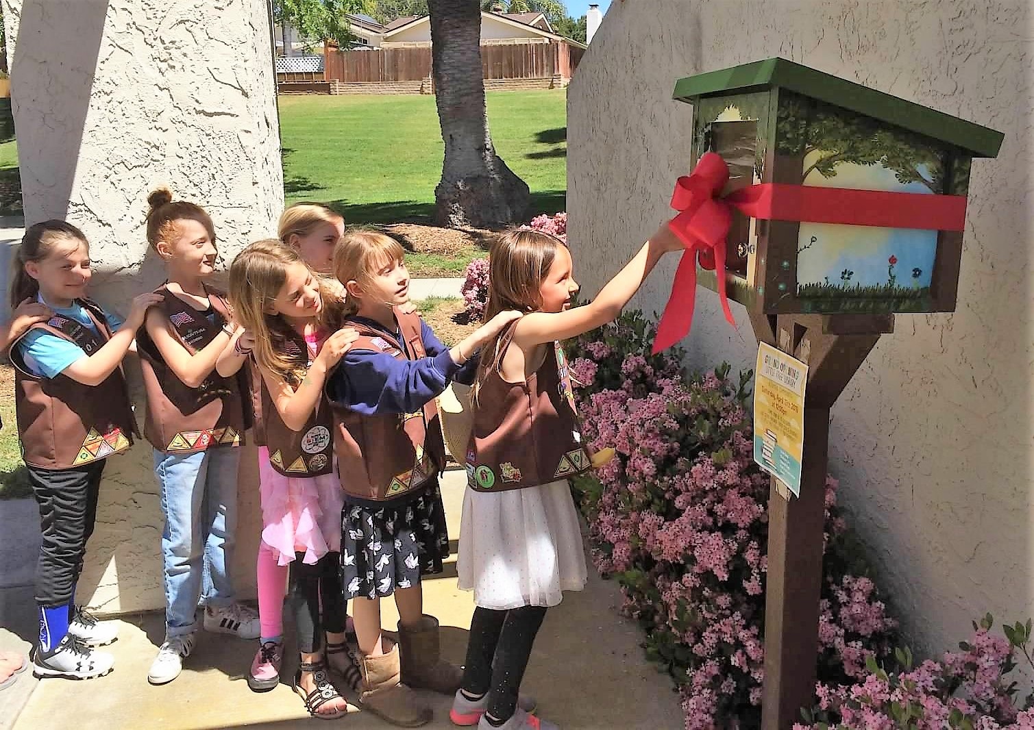 Girl Scout Brownie Troop 1501, led by County employee Melissa Bartolome, used money from cookie sales to donate a Little Free Library to the Altamira community in Carlsbad