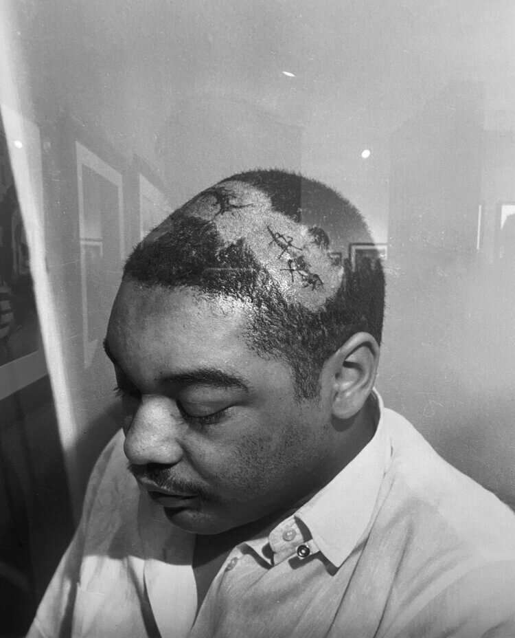   Morris Webb, beaten almost unconscious by officers, just after noon at a restaurant several blocks west of the Clayborn Temple, 1968  