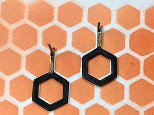 Hexagon stud on the hexagon printed paper