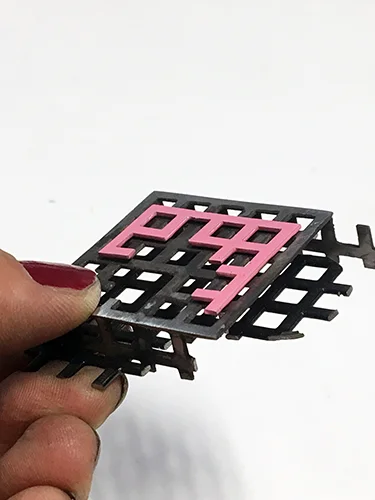 holding grid with black and pink.jpg