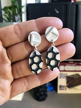 White silver with black mildsteel hexagon.