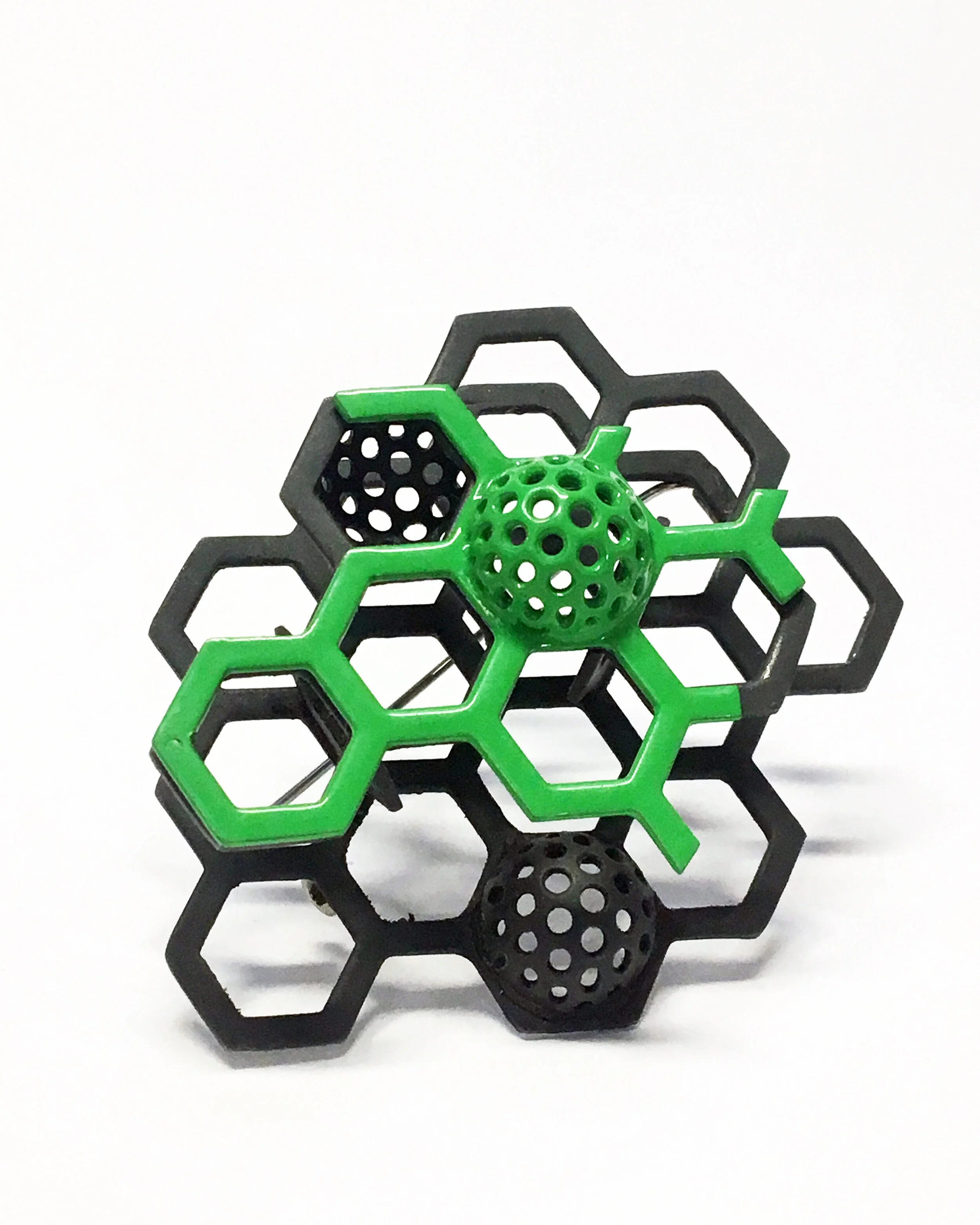 green black brooch.jpeg