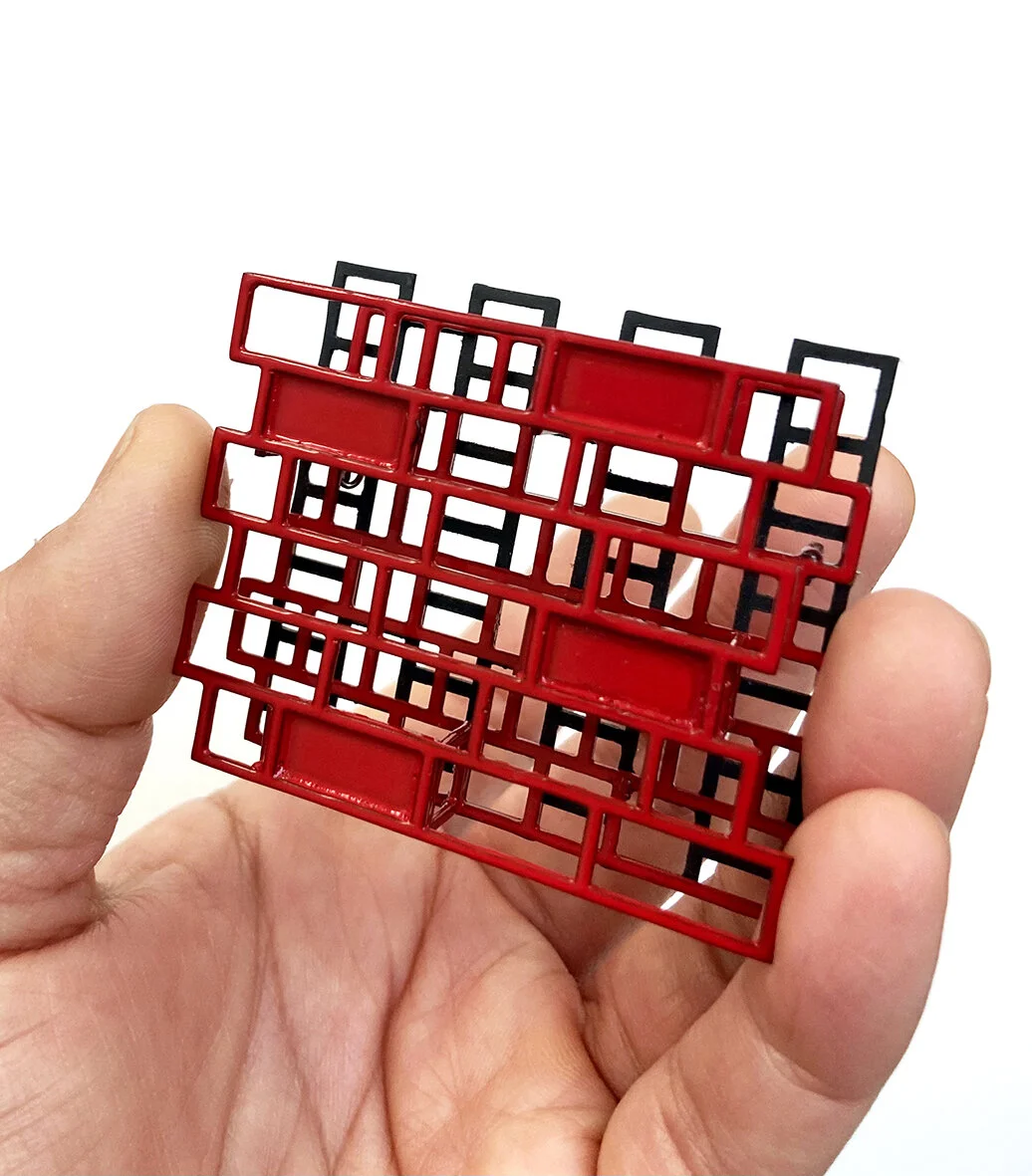 red brick on hand jpg.jpg