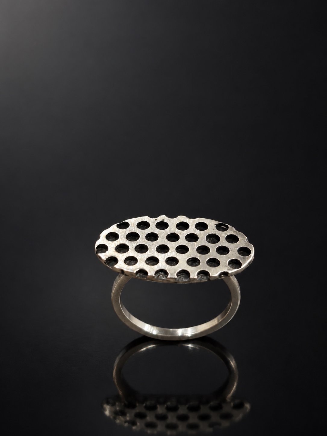 Perforated Silver Ring on Glossy Black.jpg
