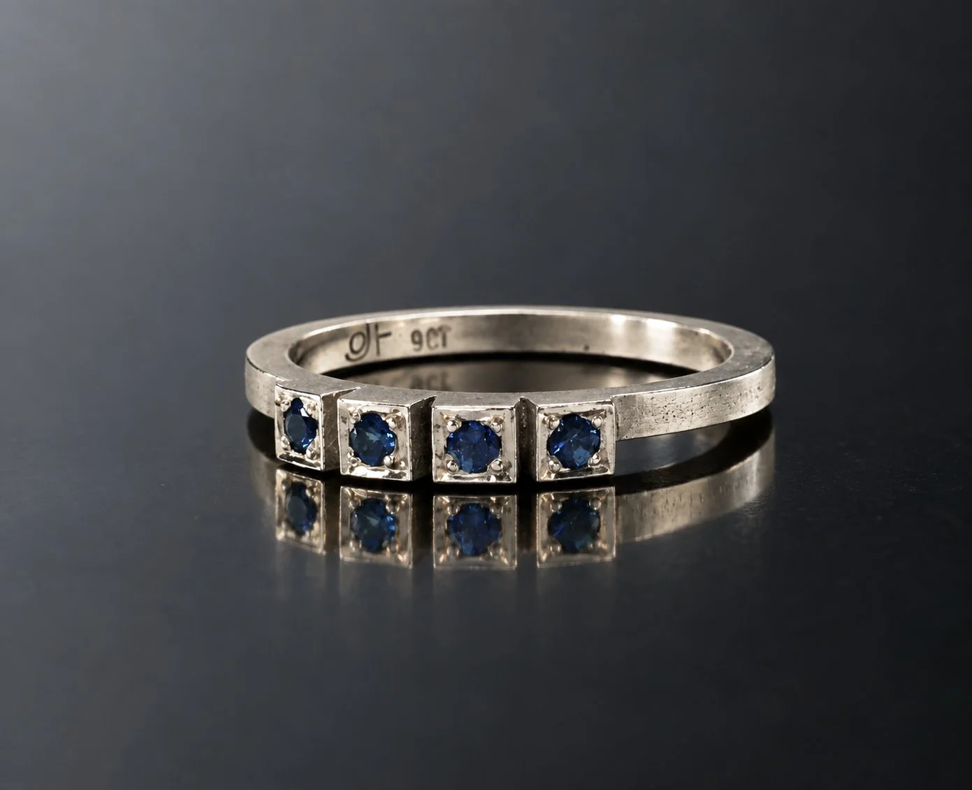 white gold with 4 sapphires ring2.jpg