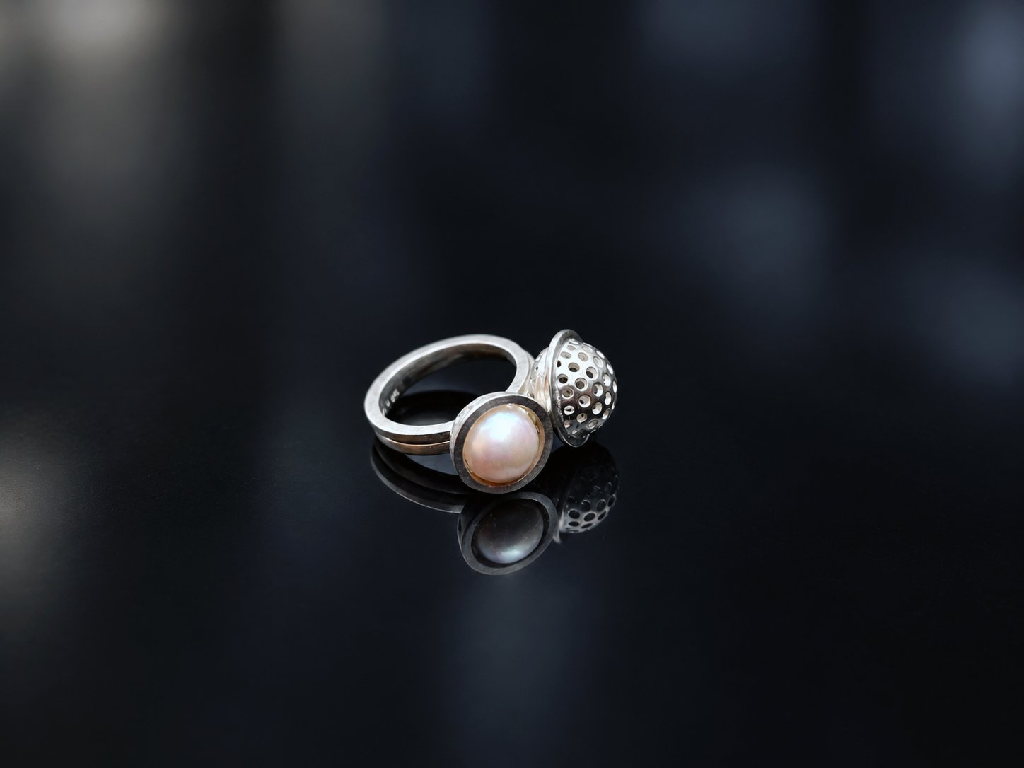 akoya pearl silver and another silver ring.jpg