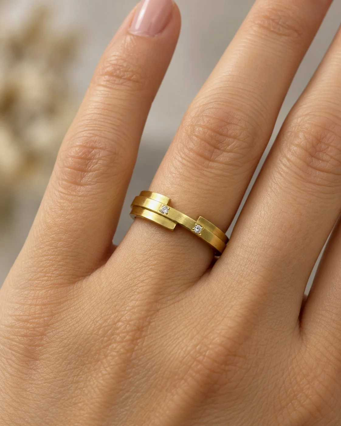 18ct y with 2 small white diamonds worn.jpg
