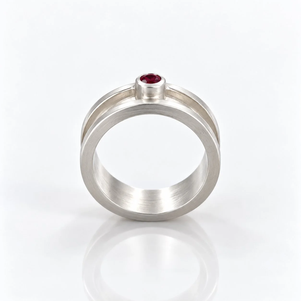 Minimalist Silver Ring with Ruby Gemstone.jpg