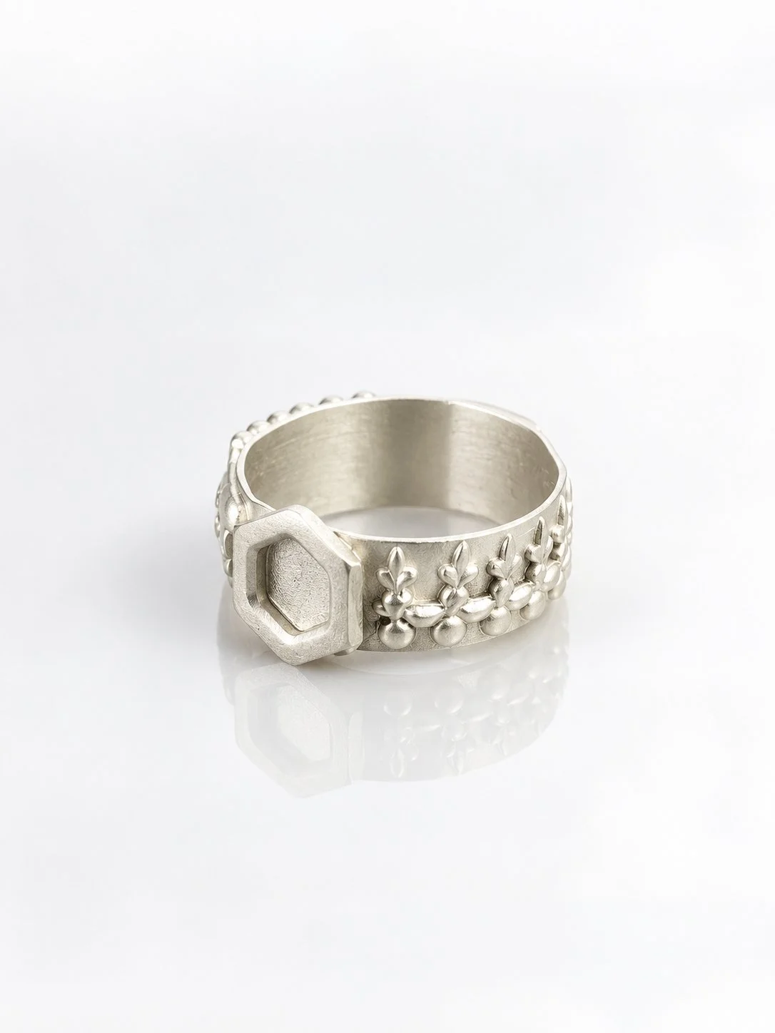 Silver Nut and Floral Motif Ring.jpg