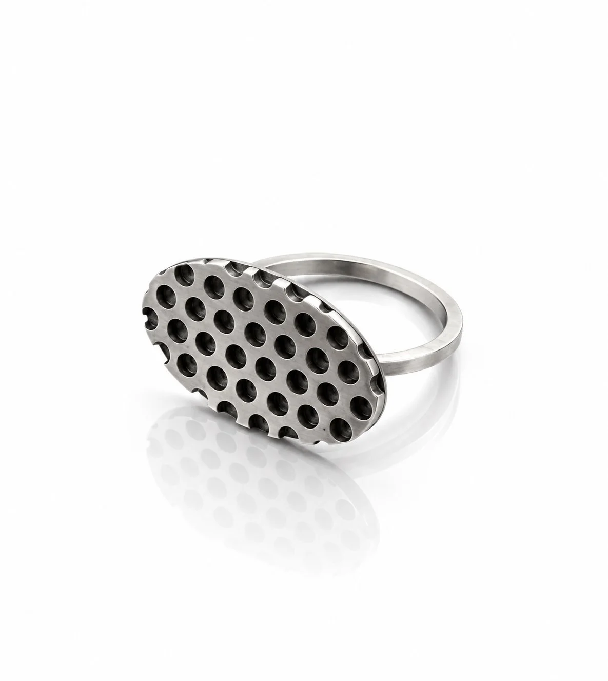 Perforated Silver Ring on White Gloss.jpg