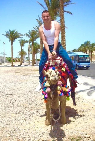 Ian riding a camel in Sharm el Sheik, Egypt.