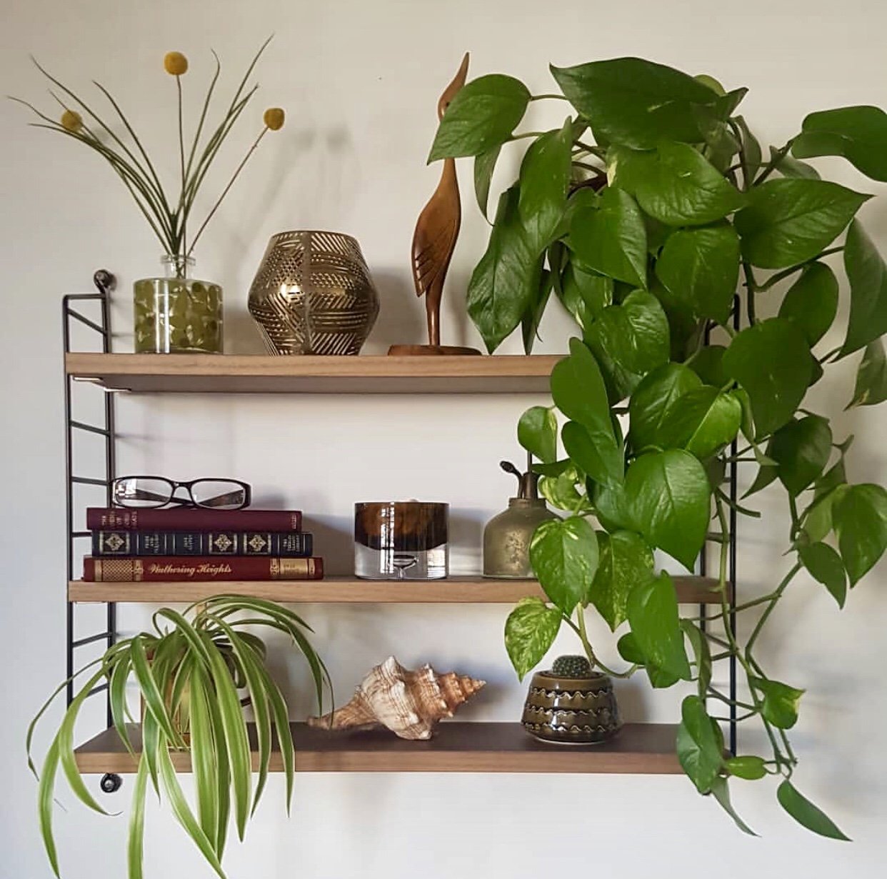 A beautifully styled Shelfie from the Queen of the Pocket String Shelf @nnekabolaji