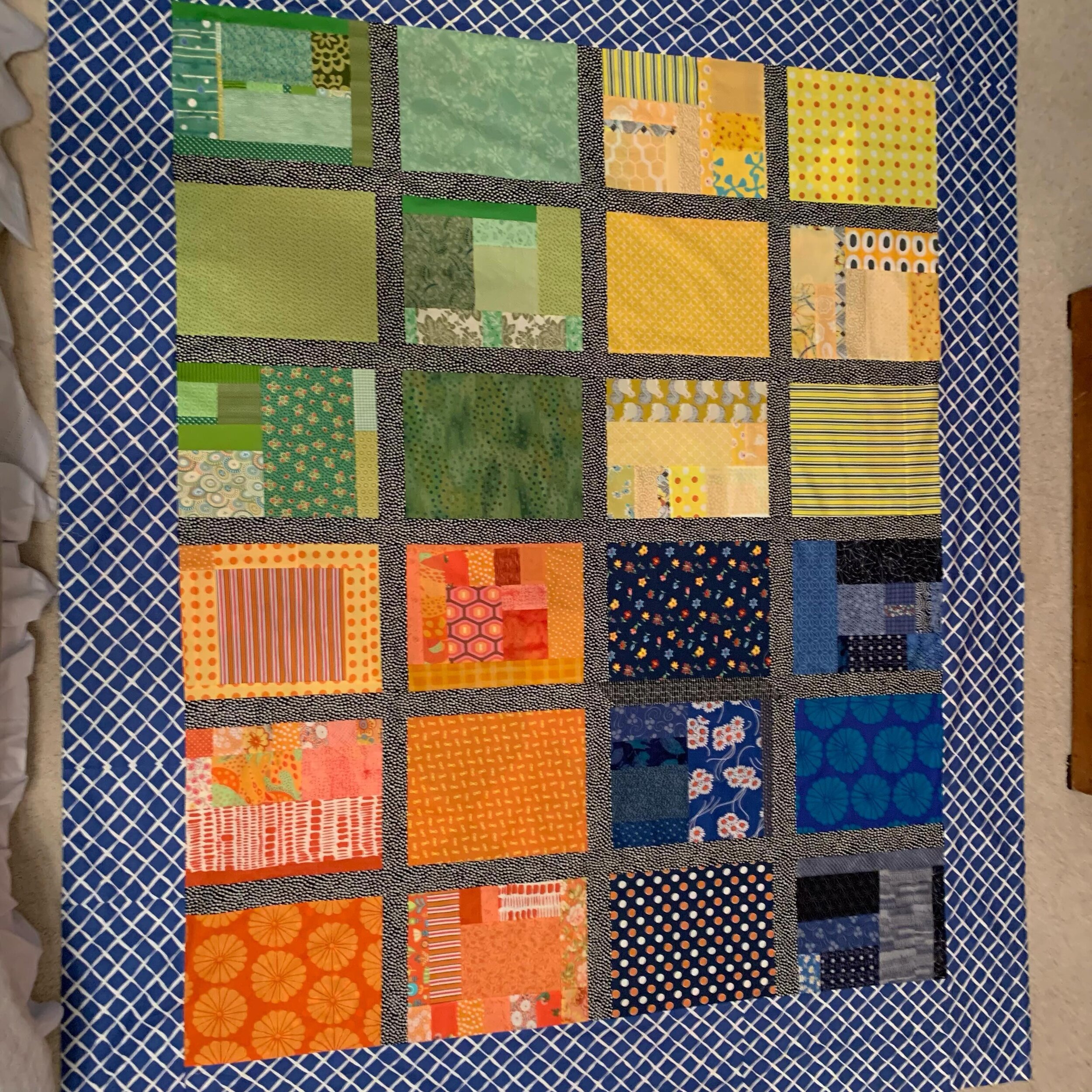 #igquiltfest Day 11&ndash;Quilt backs. I almost always stitch leftover fabric into quilt backs, typically with little attempt at artistry. But I gave this back a little more thought-it was intended as the back of a picnic quilt, but I ended up liking