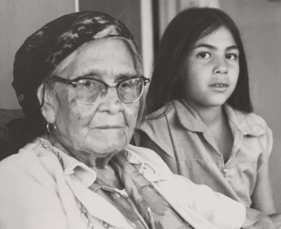 Young Felicia Cocotzin Ruiz with her grandmother •