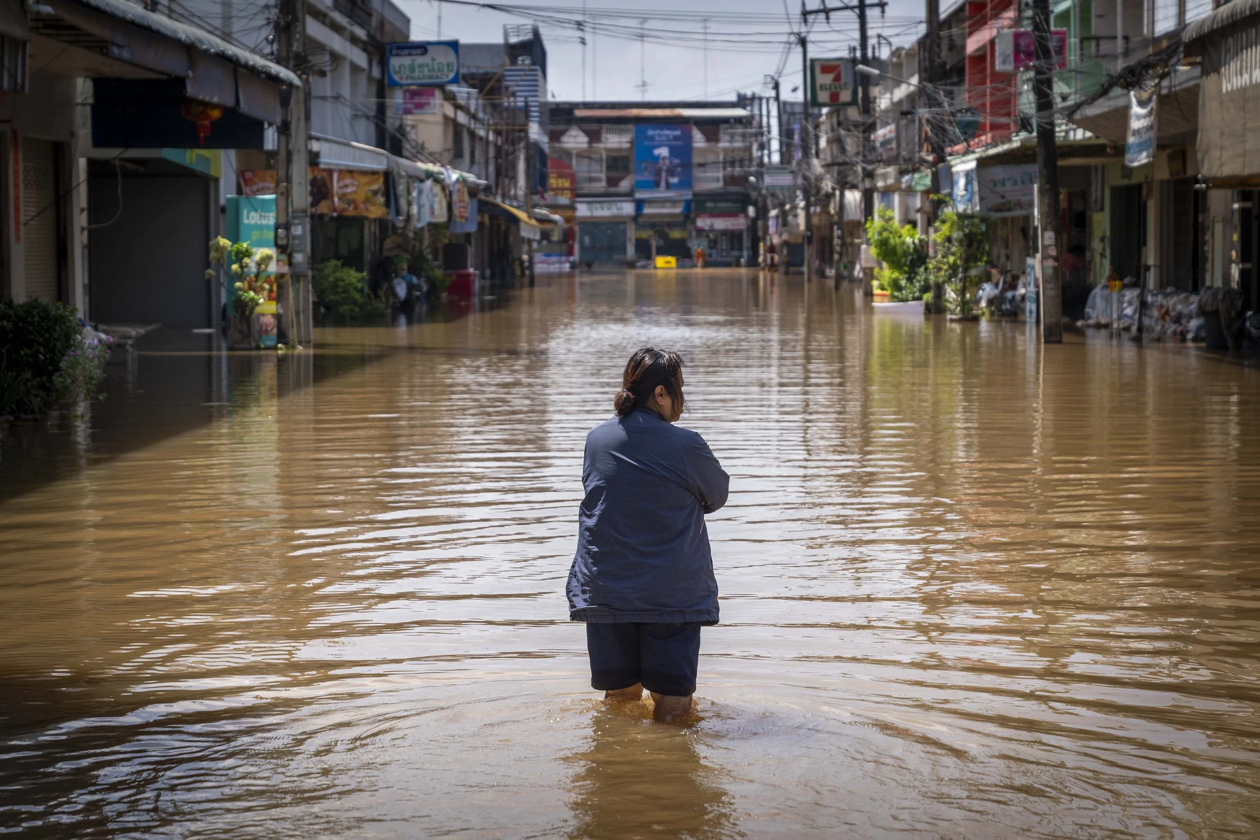 September 19, 2024: A resident on Nong Khai walks through inundated streets in Nong Khai city, Thailand which were flooded as a result of the Mekong river overflowing on September 14th, 2024. Several other provinces in northern Thailand have also be