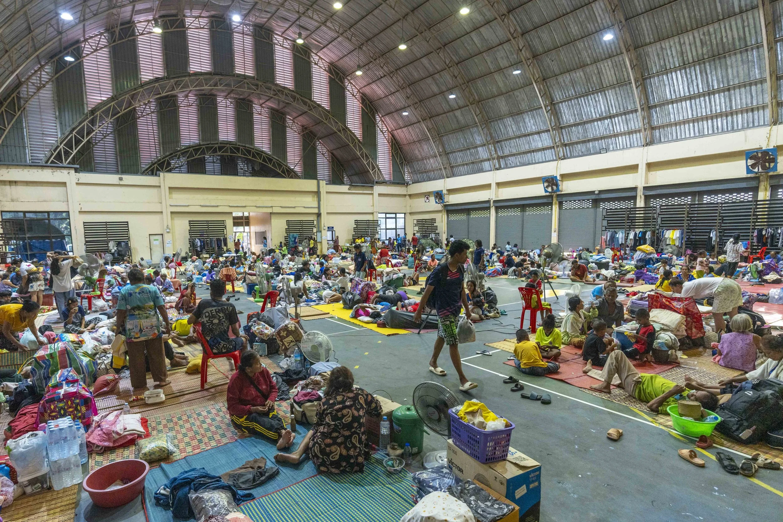 Residents of Surin province sit in an evacuation center on July 26th, 2025.