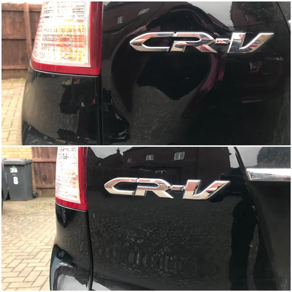 Dent removal on Hondaa CR-V, with original badge in tact