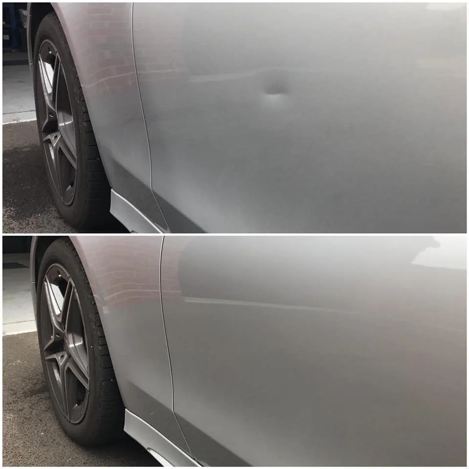 Crease in door panel frrom wheely bin removed with dent repair techniques 