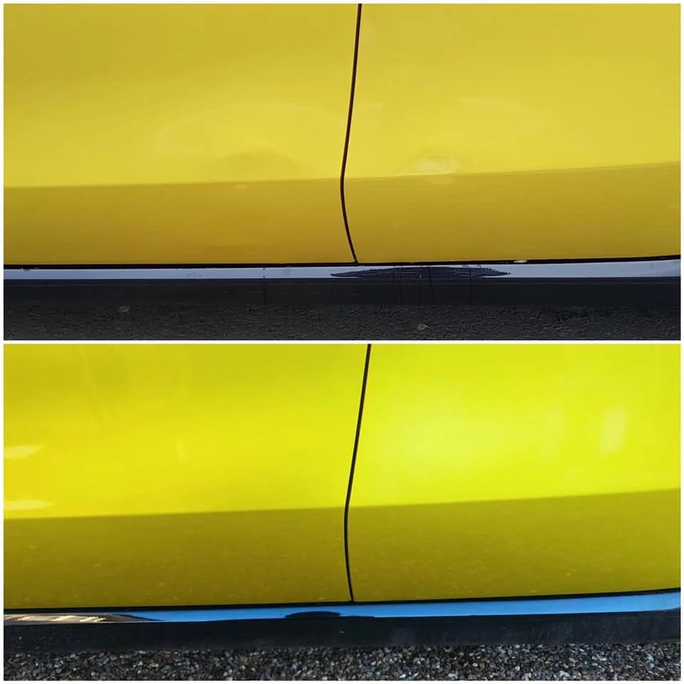 Bodyline dent on a VW from another door, repaired with dent techniques