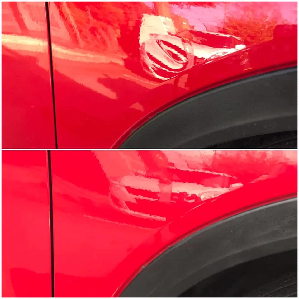 Deep dent above wheel arch repaired by jd dents