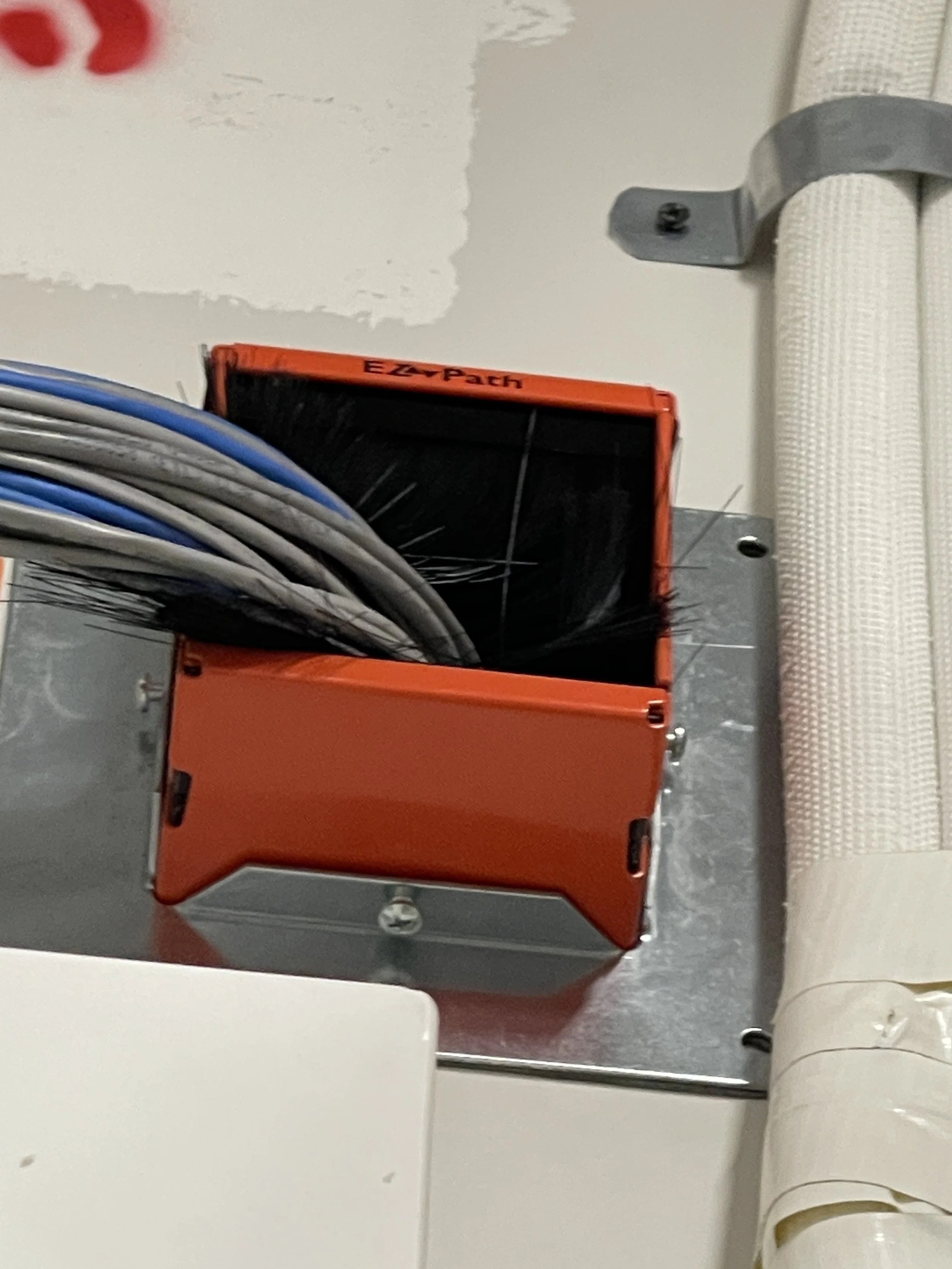 Fire Caulking and sleaves to seal walls