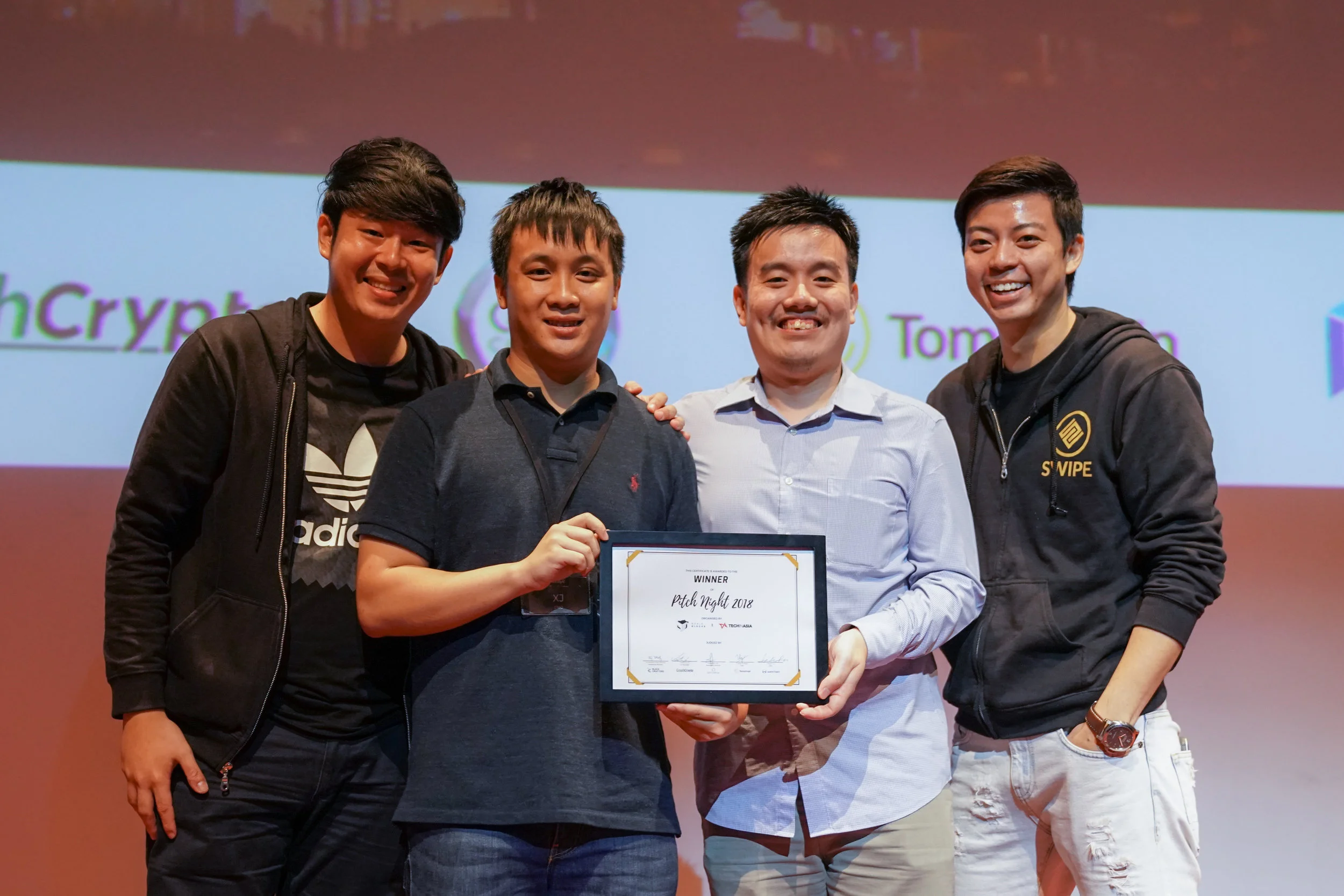 Winners of Pitch Night 2018, the SWIPE team. From left: Malcolm Chang, Pang Xue Jie (COO of WhaleBlocks), Andrew Marchen and Adam Tan.