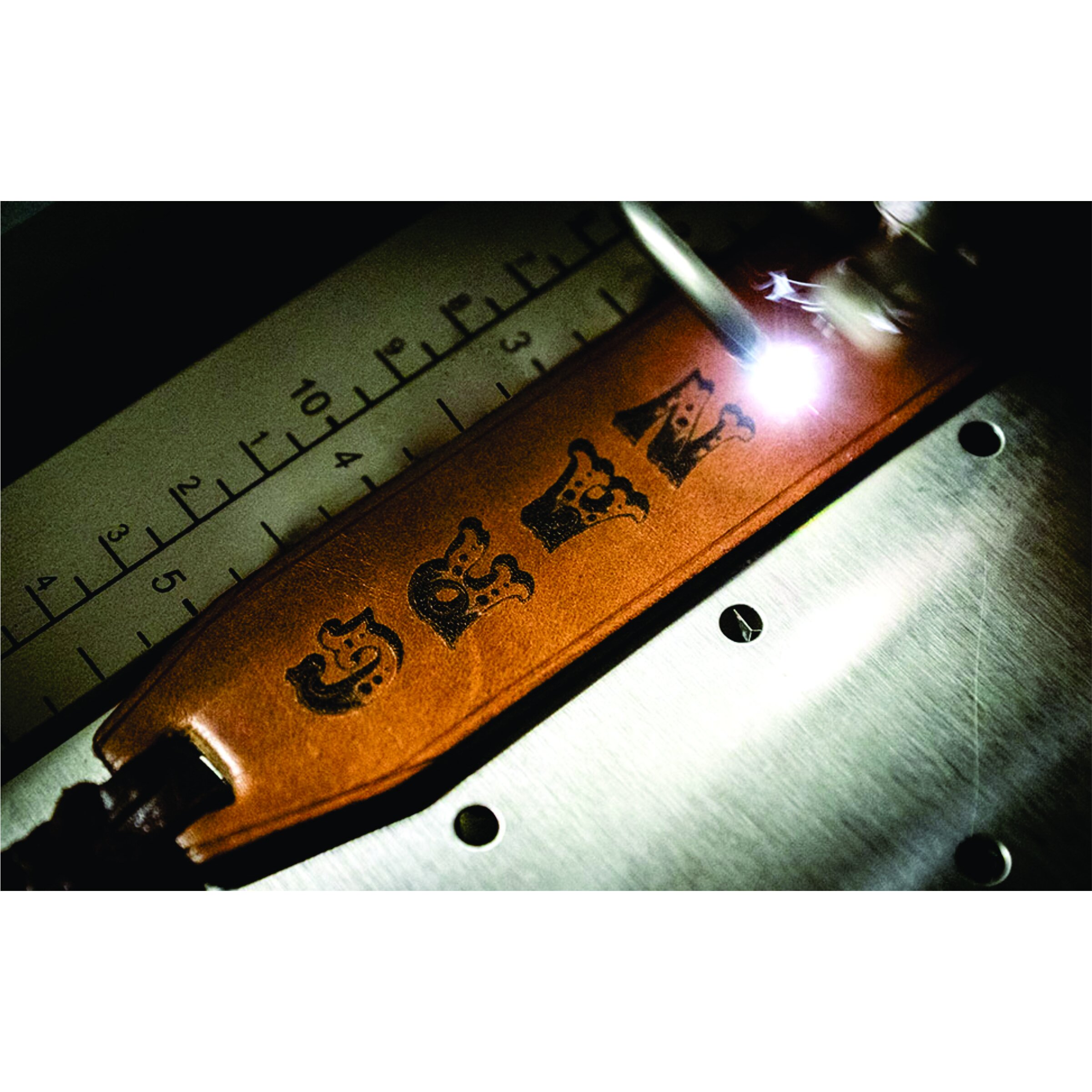 fab-laser-engraving-leather-bookmark.jpg