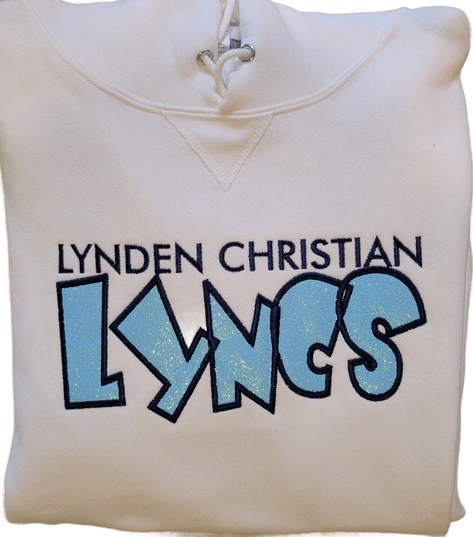Embroidered glitter twill lyncs design white.png