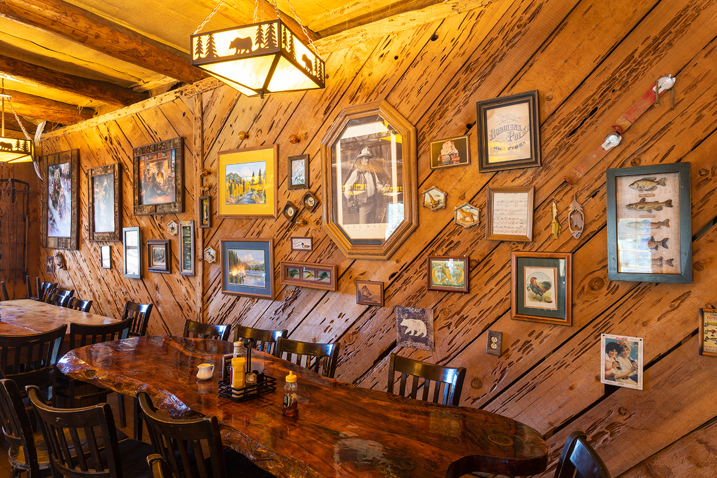 The many pictures covering one wall of the Lodge dining room