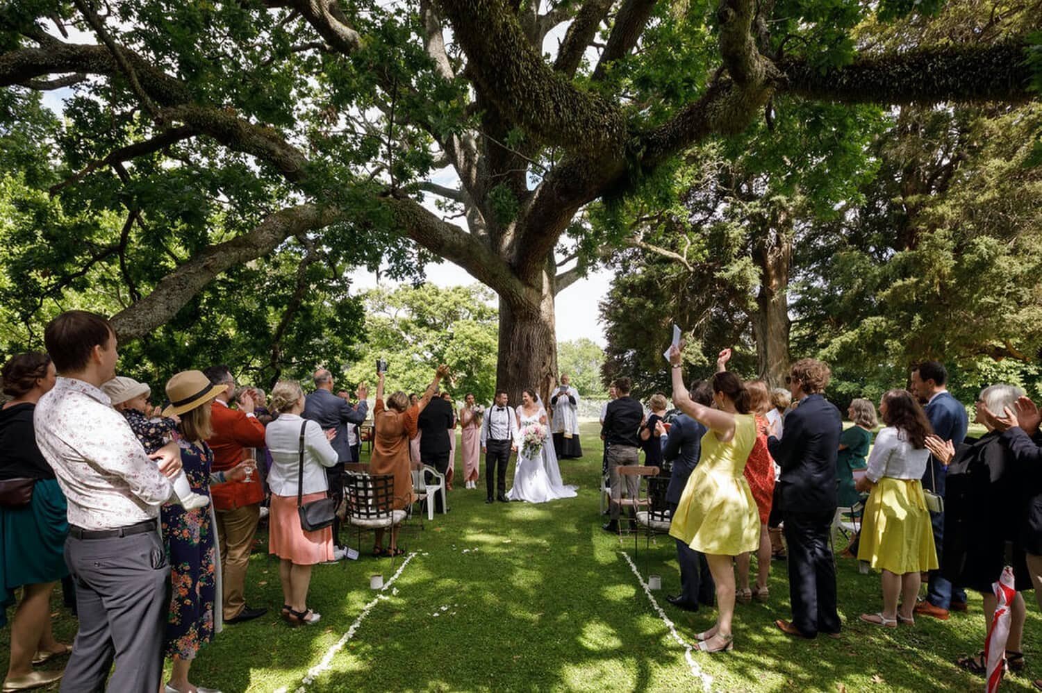 13_wairarapa-wedding-longwood-jessDewsnap18_wedding procession under amazing old tree in Featherston, Wairarapa. %0A.jpg
